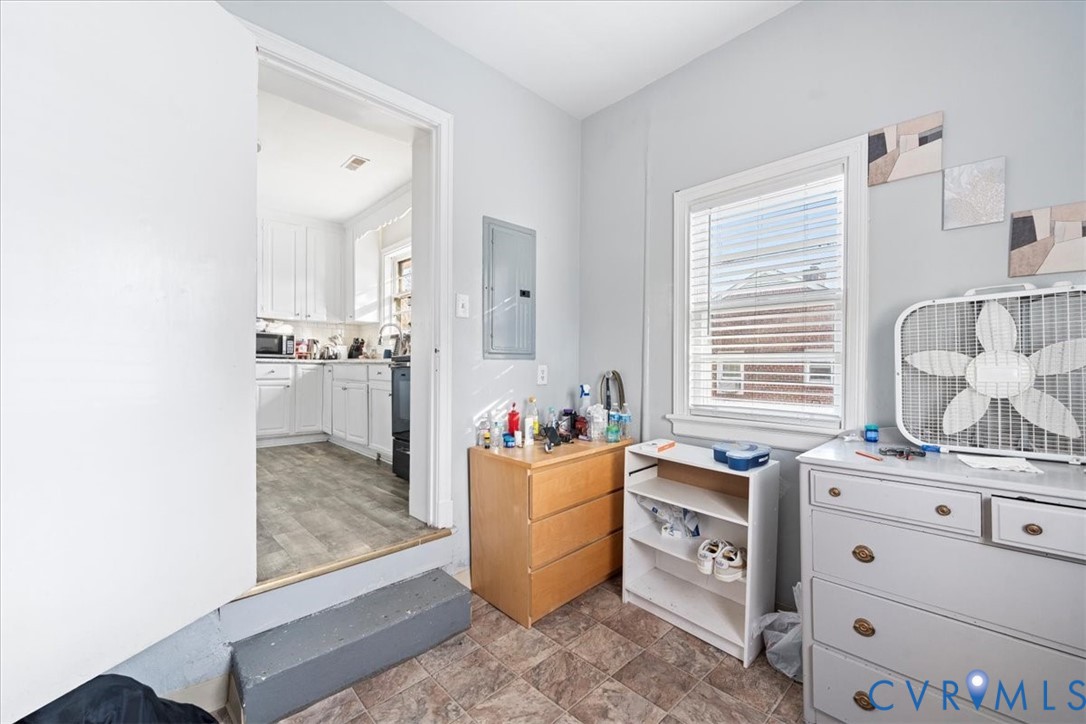 3930 Patsy Ann Drive Richmond, VA 23234 - Photo 18 of 36 Bedroom with multiple windows, electric panel, sto