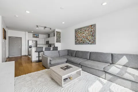 a living room with furniture and a couch
