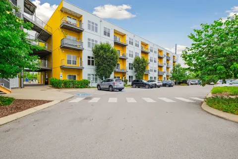 a view of a street with a building