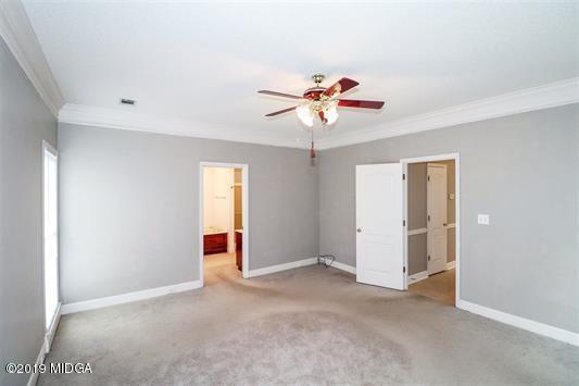 105 Wilton Circle Perry, GA 31069 - Photo 15 of 35 wooden floor in an empty room with a window