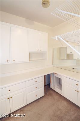 105 Wilton Circle Perry, GA 31069 - Photo 19 of 35 a kitchen with granite countertop white cabinets and white appliances