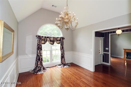 105 Wilton Circle Perry, GA 31069 - Photo 3 of 35 a view of a room with window wooden floor and chandelier