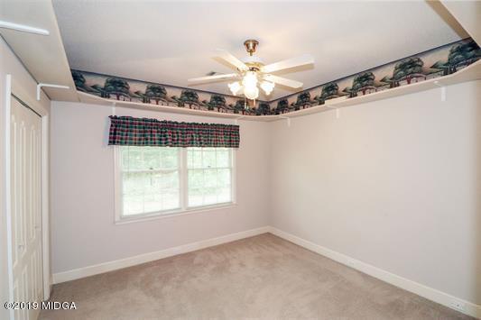 105 Wilton Circle Perry, GA 31069 - Photo 22 of 35 a view of an empty room with a window