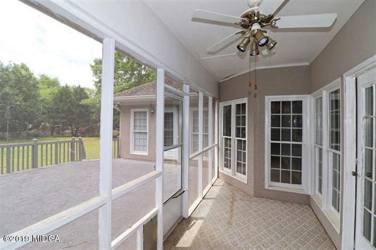 105 Wilton Circle Perry, GA 31069 - Photo 30 of 35 a view of porch with wooden floor and windows
