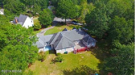 105 Wilton Circle Perry, GA 31069 - Photo 34 of 35 an aerial view of a house with swimming pool and garden