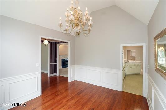 105 Wilton Circle Perry, GA 31069 - Photo 6 of 35 wooden floor in an empty room with a window