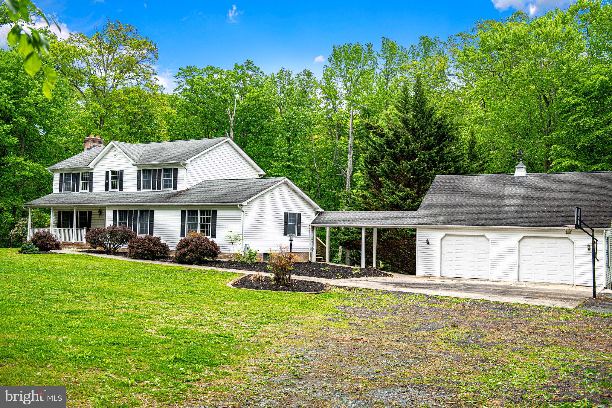 711 Gilbert Road Aberdeen, MD 21001 - Photo 28 of 54 a front view of a house with garden