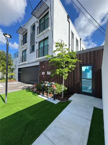 a view of a porch with a yard