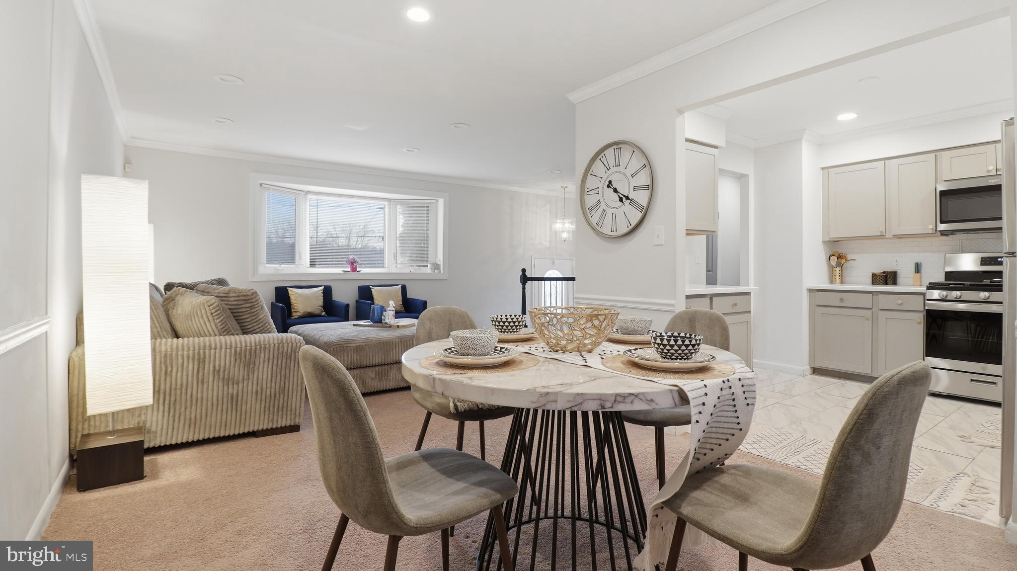 6710 Eilerson Street Clinton, MD 20735 - Photo 11 of 58 a view of a dining room with furniture