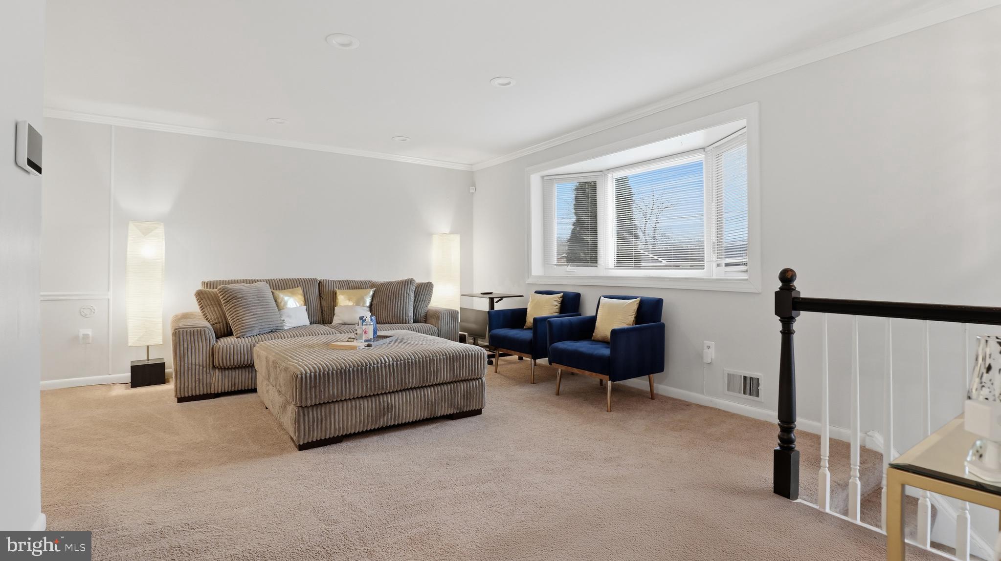 6710 Eilerson Street Clinton, MD 20735 - Photo 18 of 58 a living room with furniture and a window