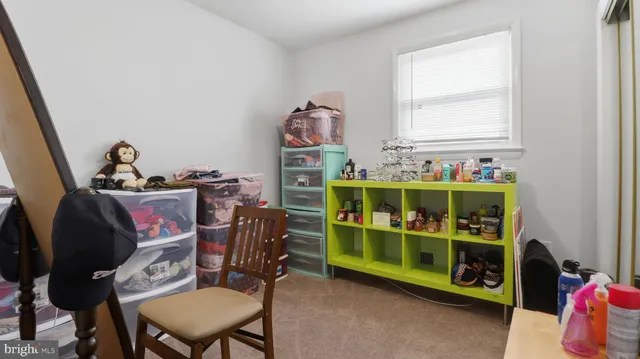 a view of a workspace with furniture