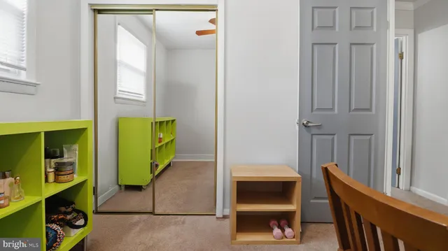 a hotel room with furniture and a window