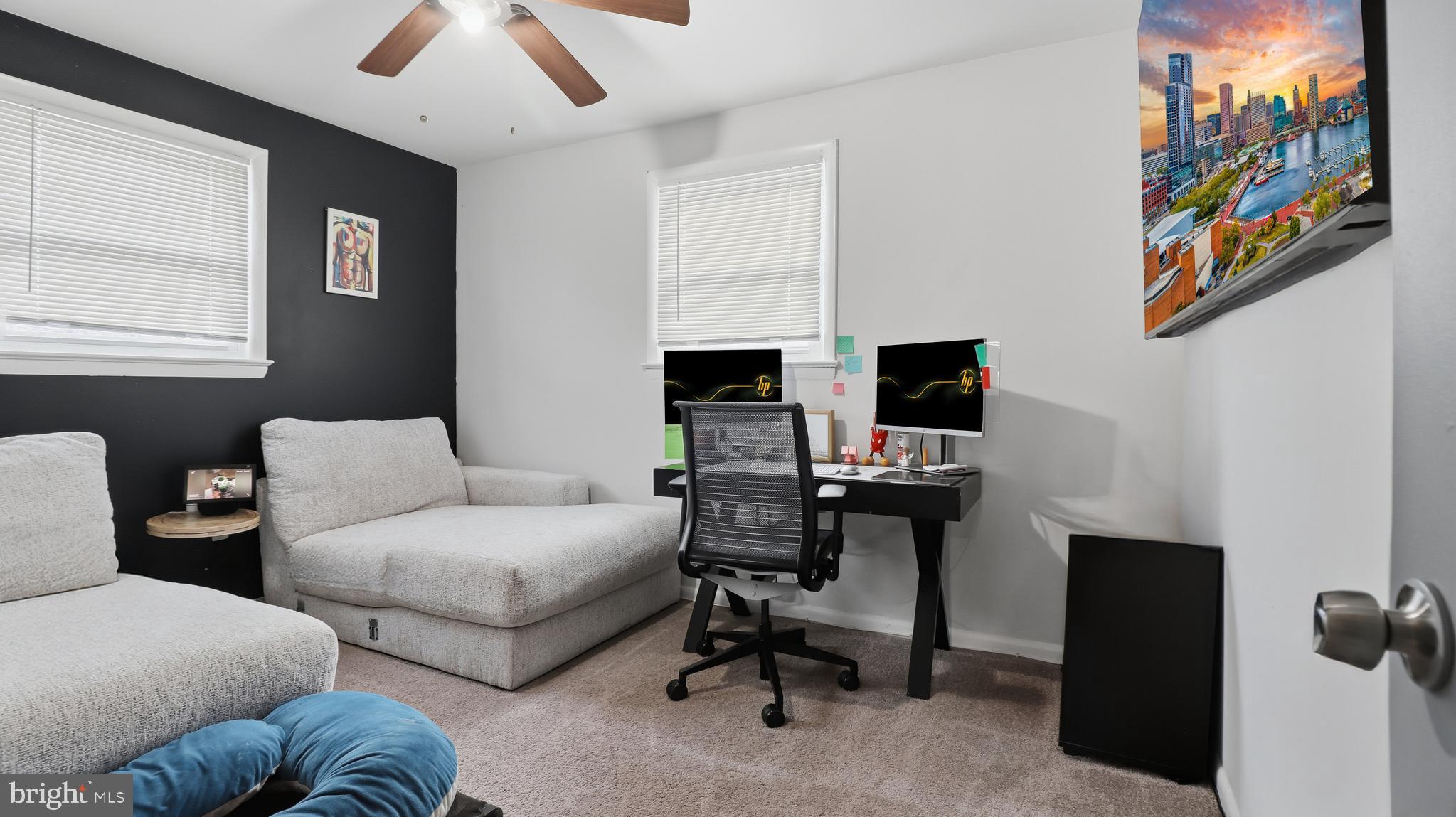 6710 Eilerson Street Clinton, MD 20735 - Photo 24 of 58 a living room with furniture a rug and a window