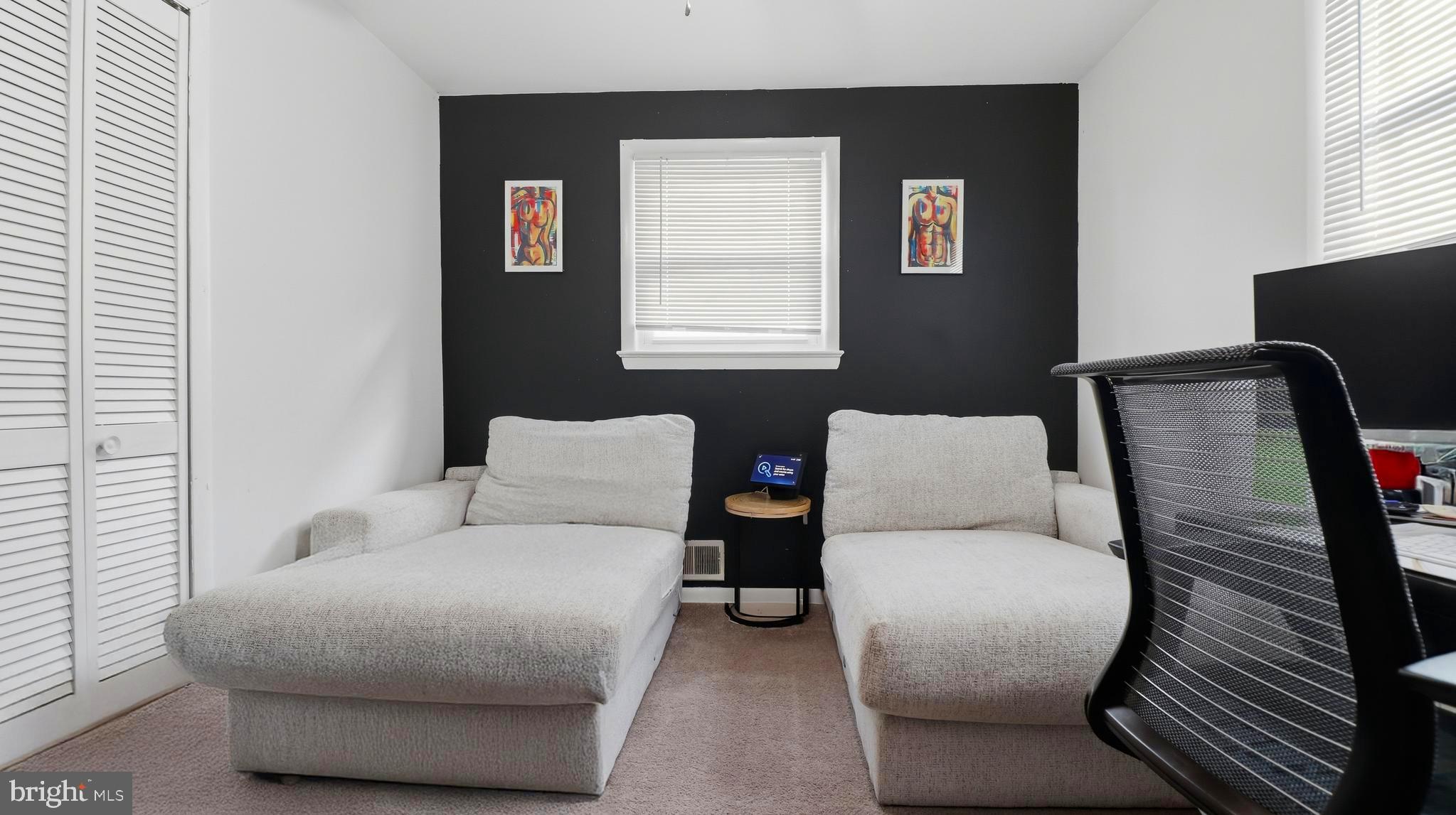 6710 Eilerson Street Clinton, MD 20735 - Photo 26 of 58 a hotel room with furniture and a window