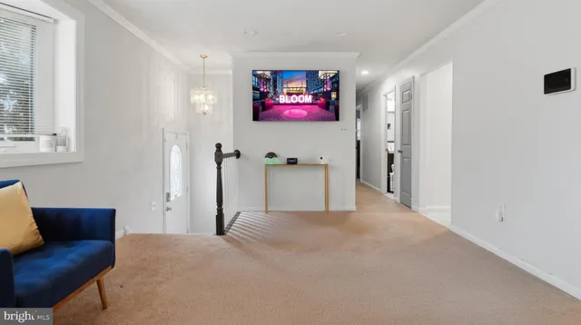 a view of a livingroom with furniture and a couch