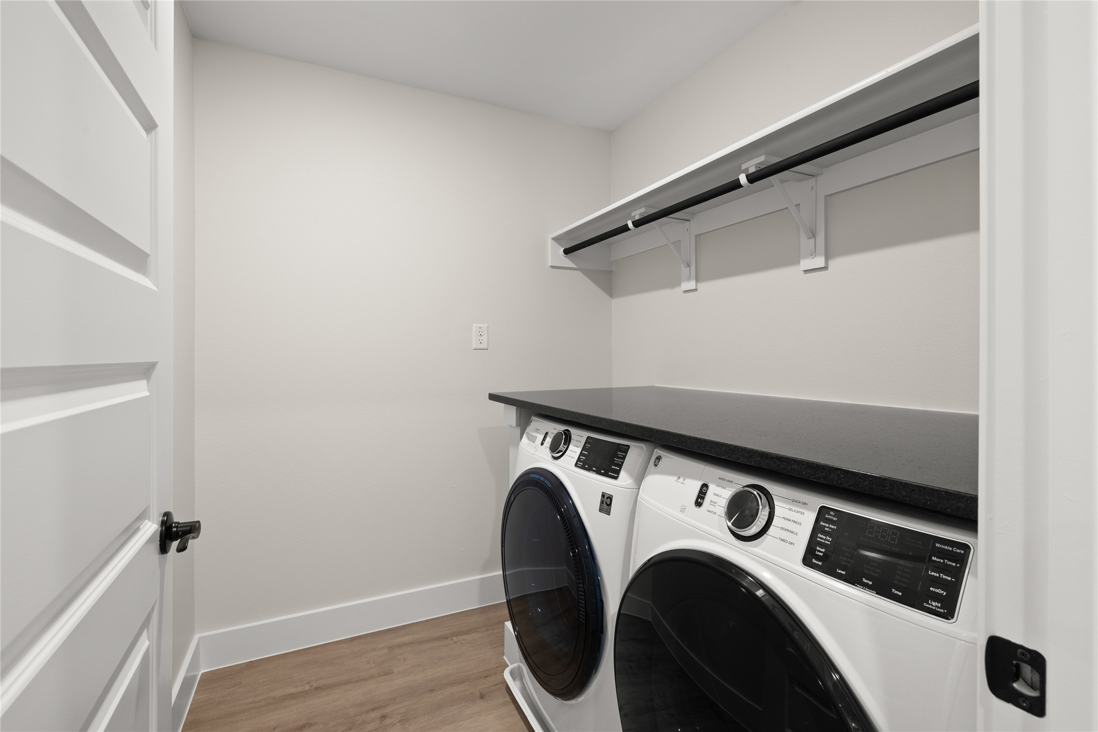 5514 Mobeetie Loop Bee Cave, TX 78738 - Photo 14 of 20 a utility room with dryer and washer