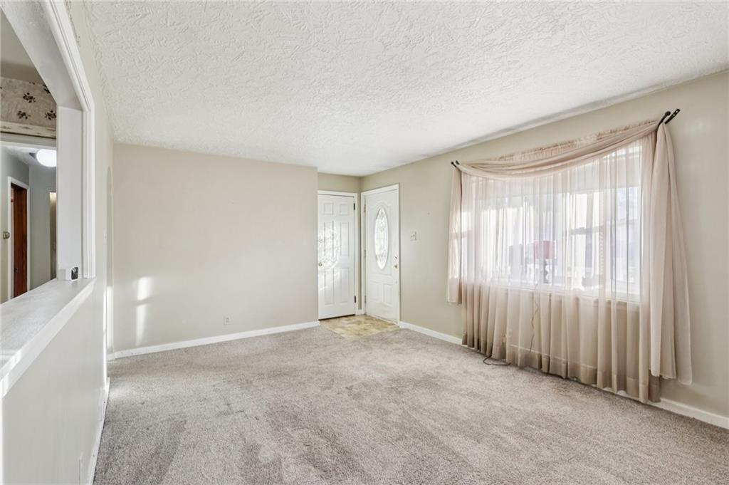 2422 Ridgewood Court New Castle, PA 16101 - Photo 11 of 50 a view of an empty room and a window