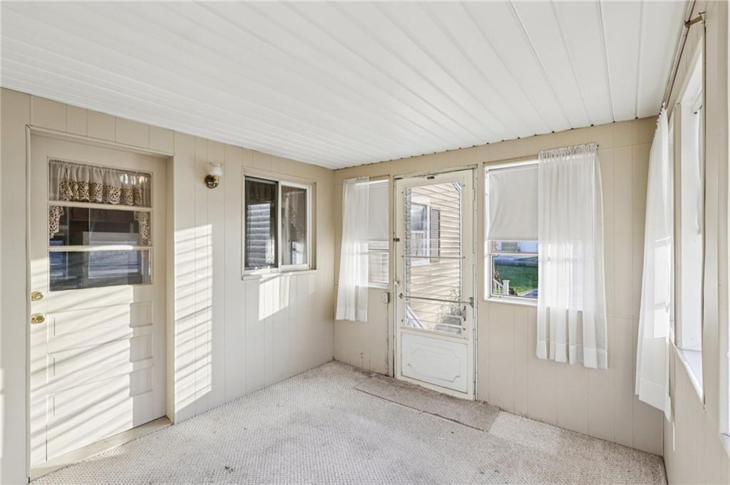 2422 Ridgewood Court New Castle, PA 16101 - Photo 19 of 50 a view of an empty room with a window
