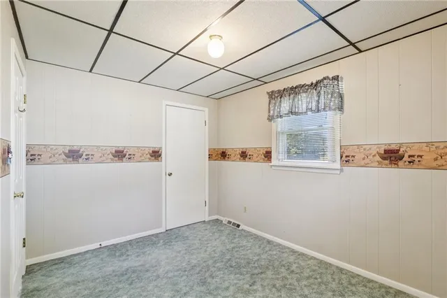 a view of a storage & utility room with window