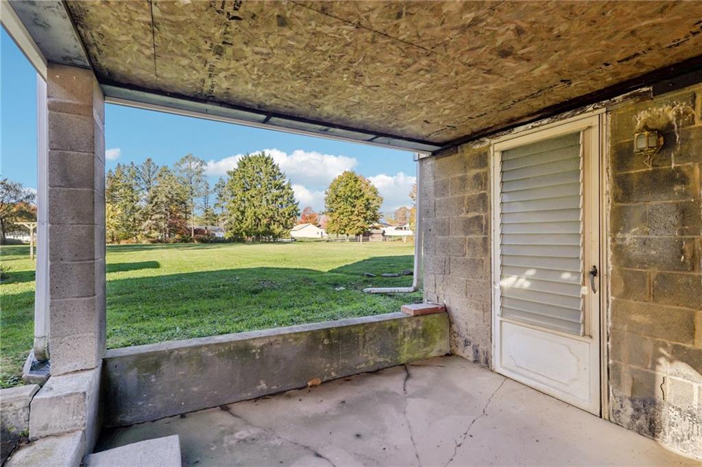 2422 Ridgewood Court New Castle, PA 16101 - Photo 45 of 50 a front view of a house with a yard