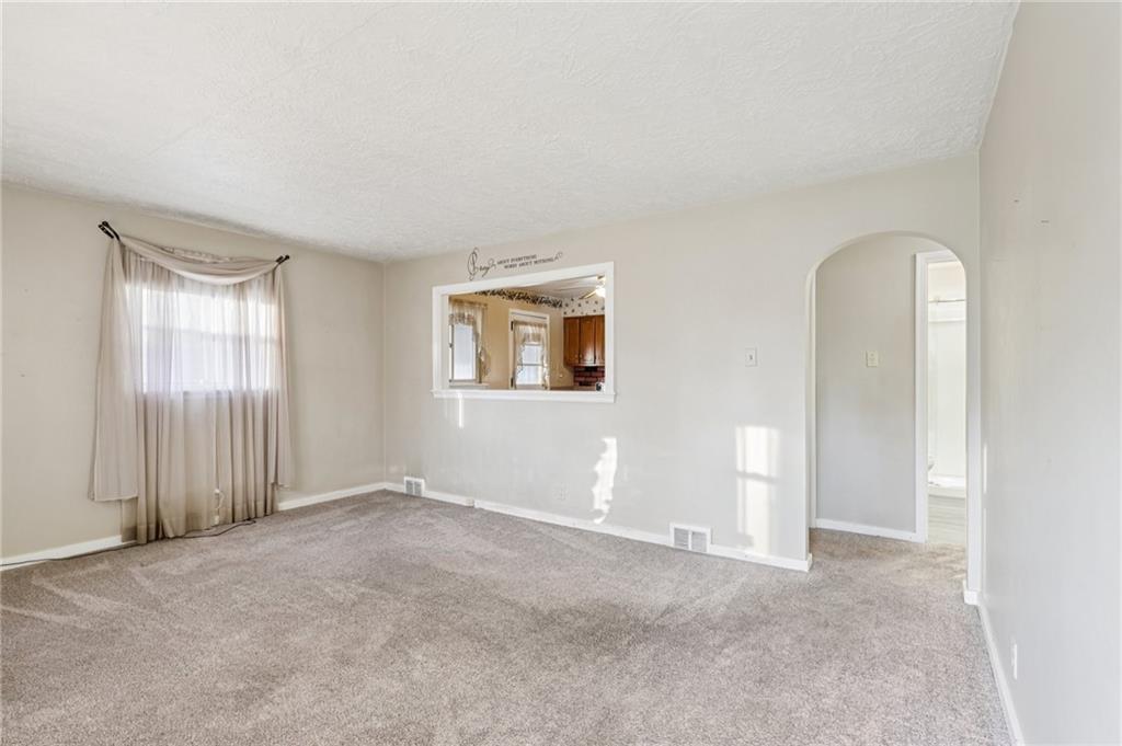 2422 Ridgewood Court New Castle, PA 16101 - Photo 9 of 50 an empty room with windows and closet