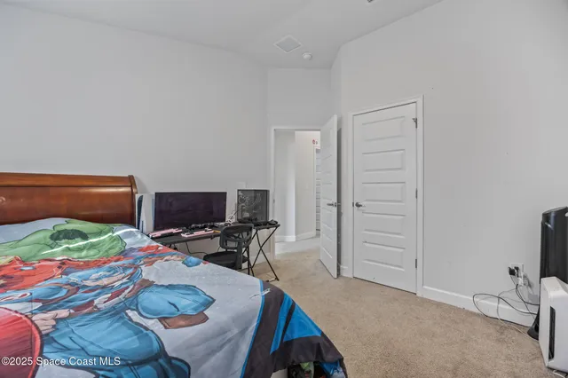 a workspace with furniture and a gate