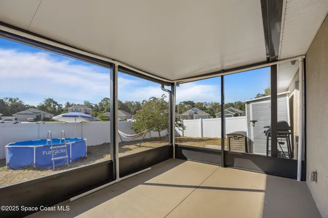 a view of a balcony with city view