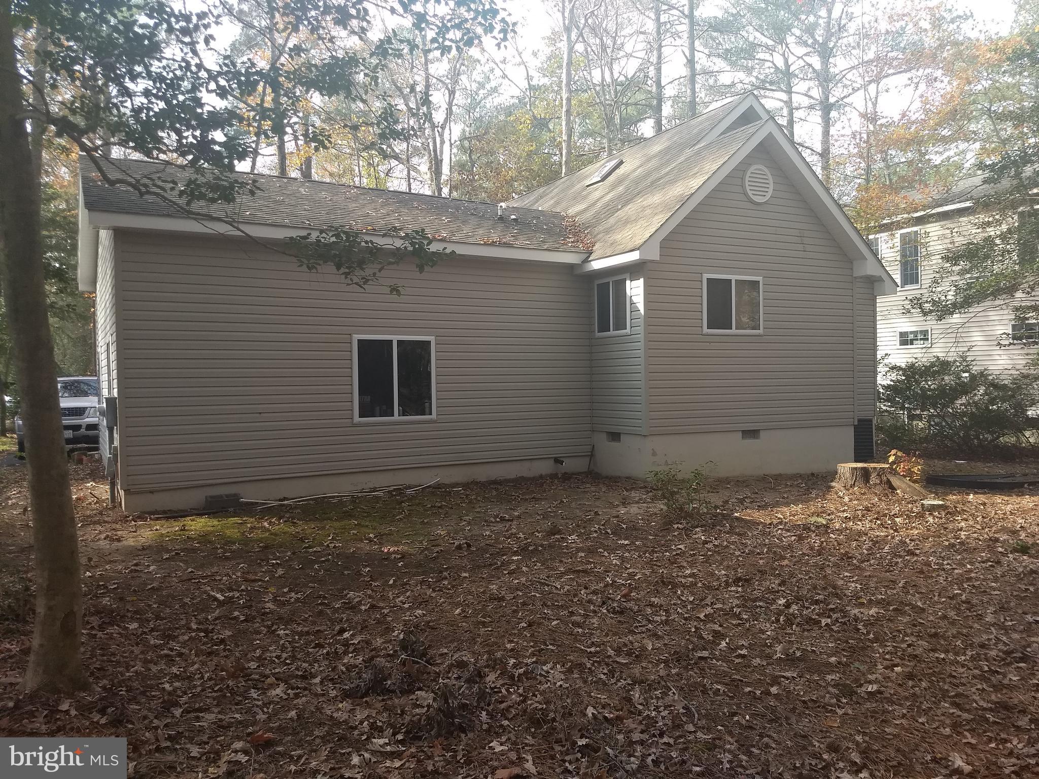 98 Pinehurst Road Ocean Pines, MD 21811 - Photo 38 of 61 garage and home back view