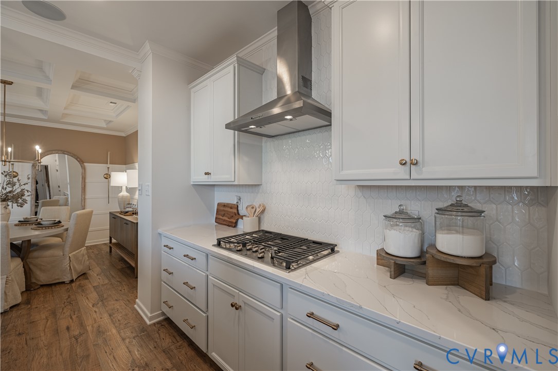 6609 Mayland Rdg Lane; Moseley, VA 23120 - Photo 7 of 20 a kitchen with stainless steel appliances a sink and cabinets