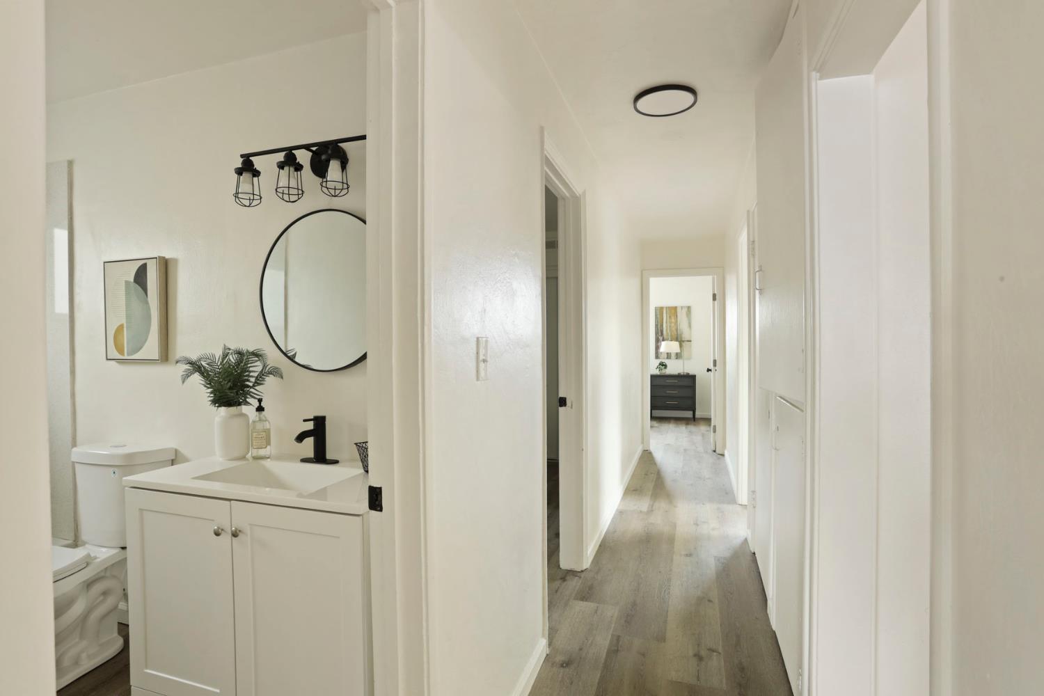 1636 South School Street Lodi, CA 95240 - Photo 20 of 33 a view of a bathroom from a hallway