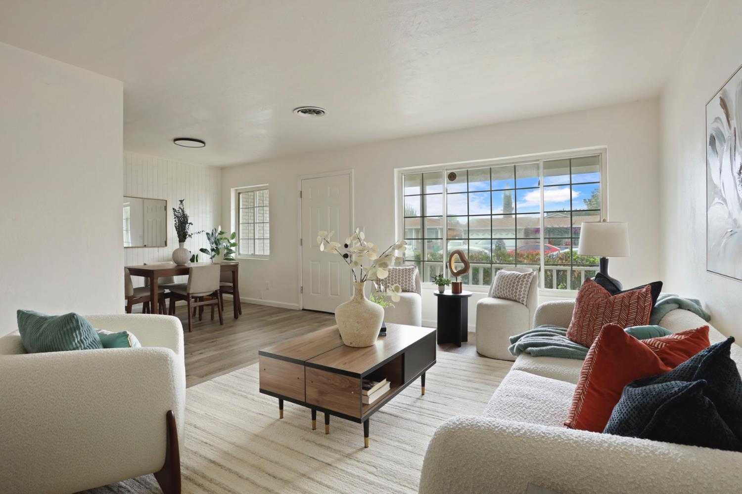 1636 South School Street Lodi, CA 95240 - Photo 7 of 33 a living room with furniture and a large window