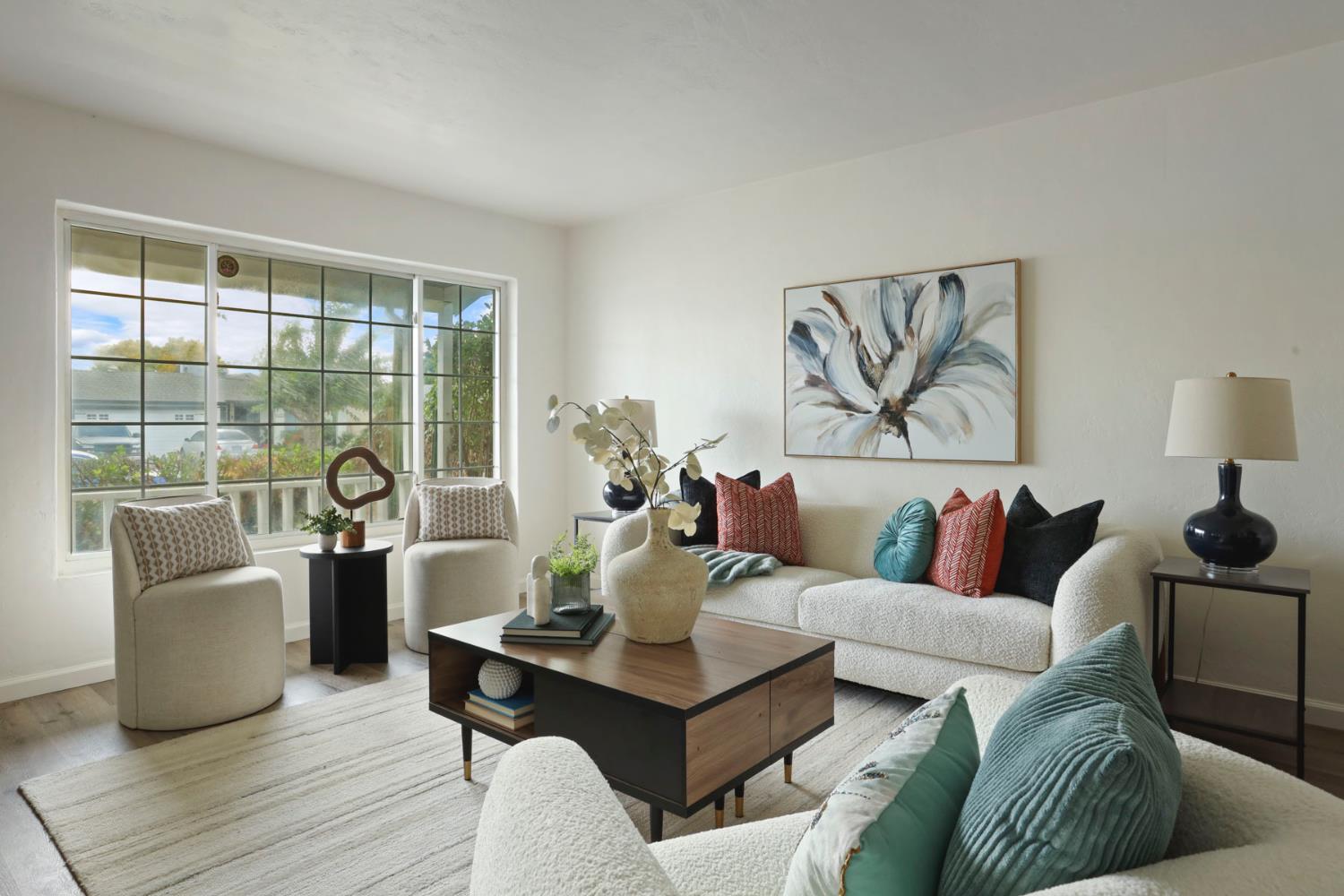 1636 South School Street Lodi, CA 95240 - Photo 8 of 33 a living room with furniture and a large window