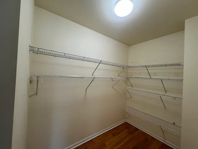 a view of a room with racks on the wall