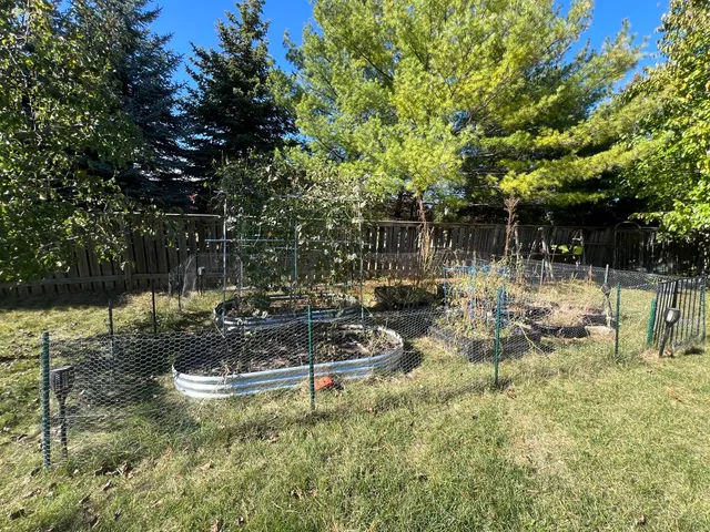 a view of swimming pool with a bench