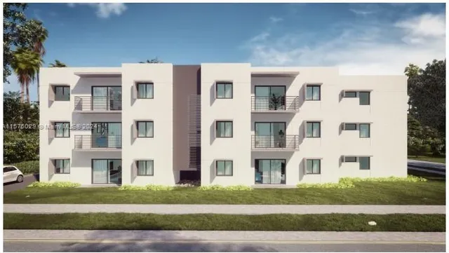 a view of a brick building with glass windows