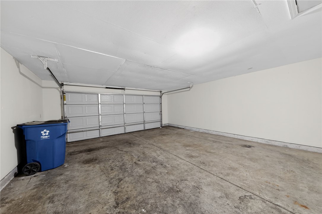 6070 Charlesgate Road Huber Heights, OH 45424 - Photo 5 of 29 This spacious garage offers practical utility for vehicles and storage.