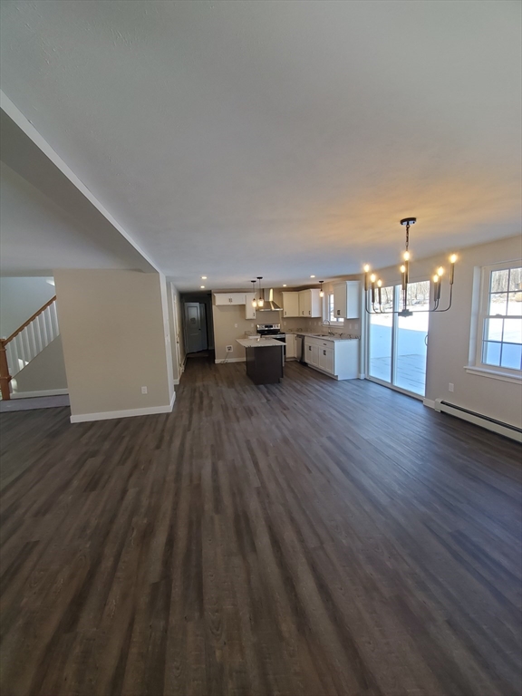 205 Whitney Road Phillipston, MA 01331 - Photo 5 of 8 a view of a livingroom with furniture and wooden floor