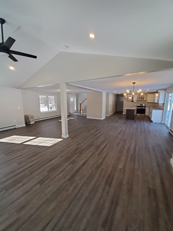 205 Whitney Road Phillipston, MA 01331 - Photo 6 of 8 a view of a livingroom with hardwood floor and a ceiling fan