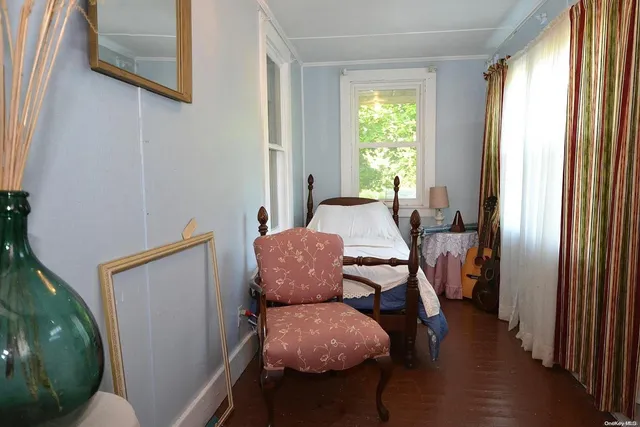 a view of livingroom with furniture and wooden floor
