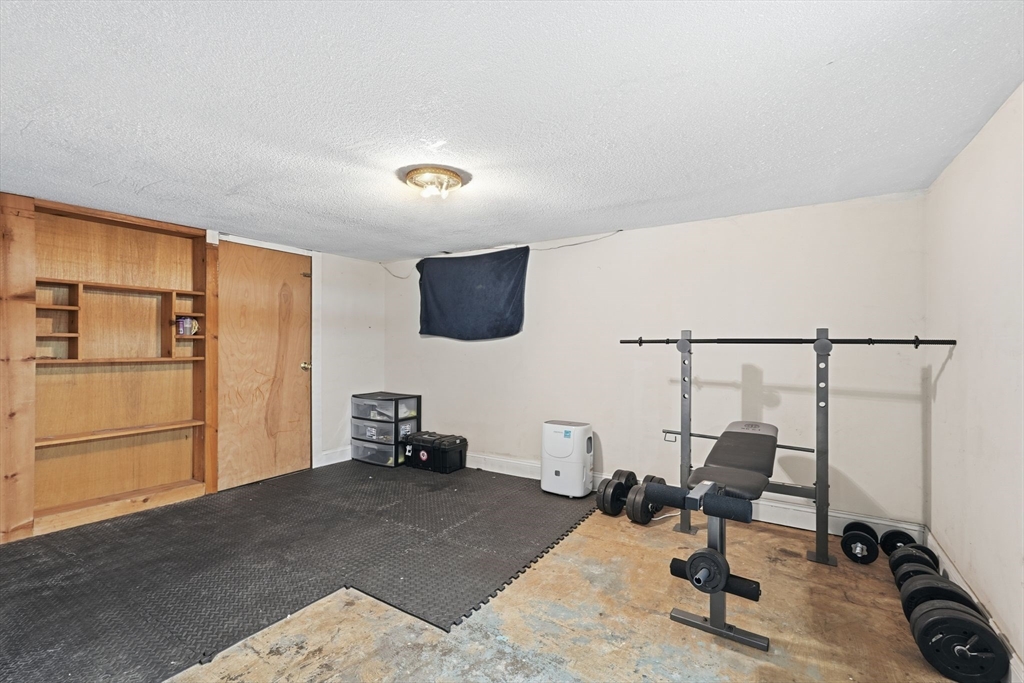 18 Charpentier Boulevard Chicopee, MA 01013 - Photo 24 of 37 a view of a workspace with furniture and a window