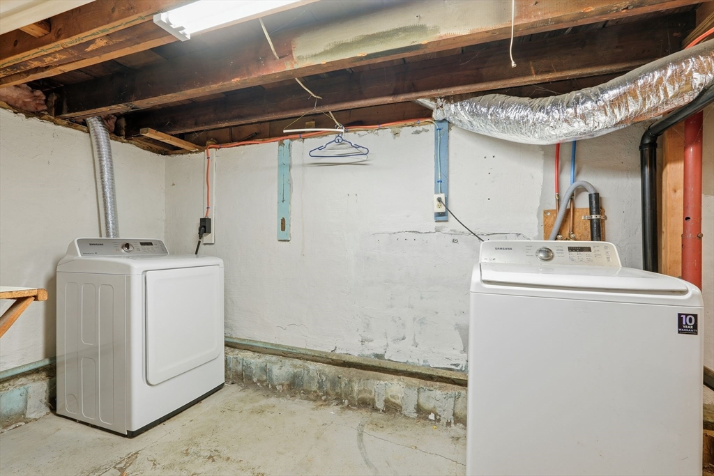 18 Charpentier Boulevard Chicopee, MA 01013 - Photo 26 of 37 a utility room with dryer and washer