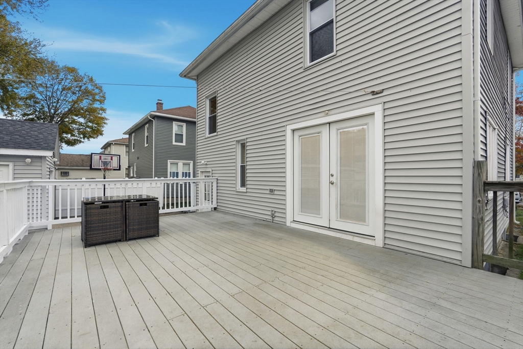 18 Charpentier Boulevard Chicopee, MA 01013 - Photo 27 of 37 a view of a house with barbeque oven and furniture