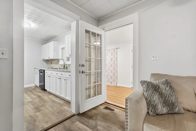 a room with a bed and a cabinets