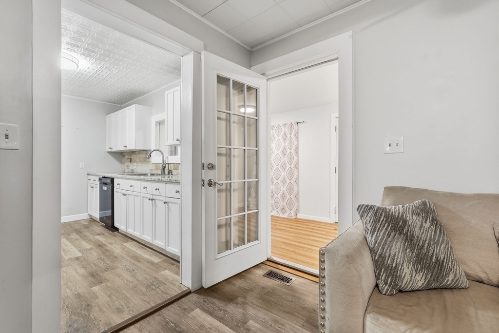 18 Charpentier Boulevard Chicopee, MA 01013 - Photo 7 of 37 a room with a bed and a cabinets