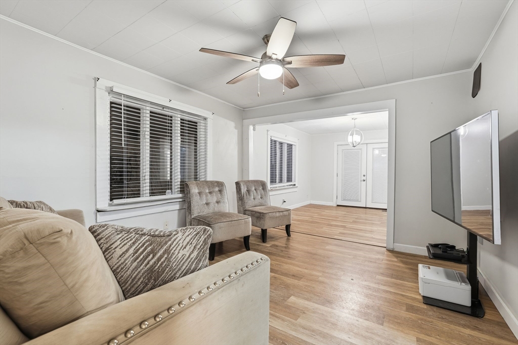 18 Charpentier Boulevard Chicopee, MA 01013 - Photo 8 of 37 a living room with furniture and a large window