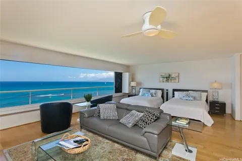 a living room with furniture and a rug