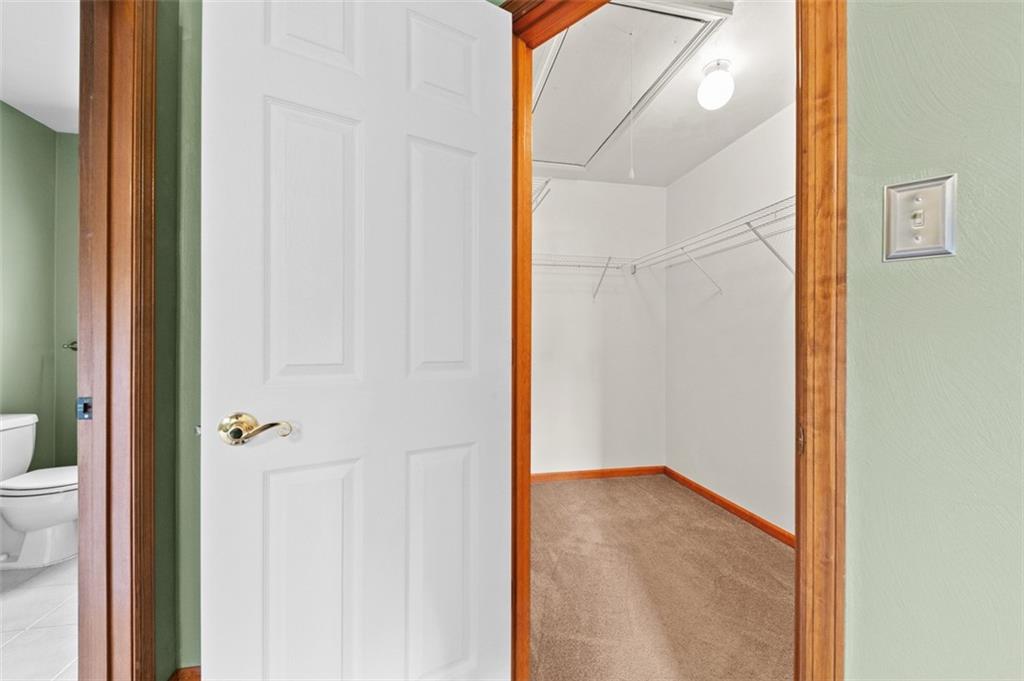 5 Kalyn Court Irwin, PA 15642 - Photo 29 of 40 Master Bedroom walk in closet with pull down attic access