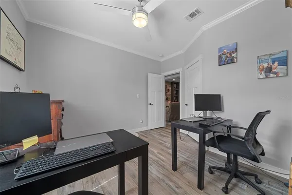 a view of a workspace with furniture