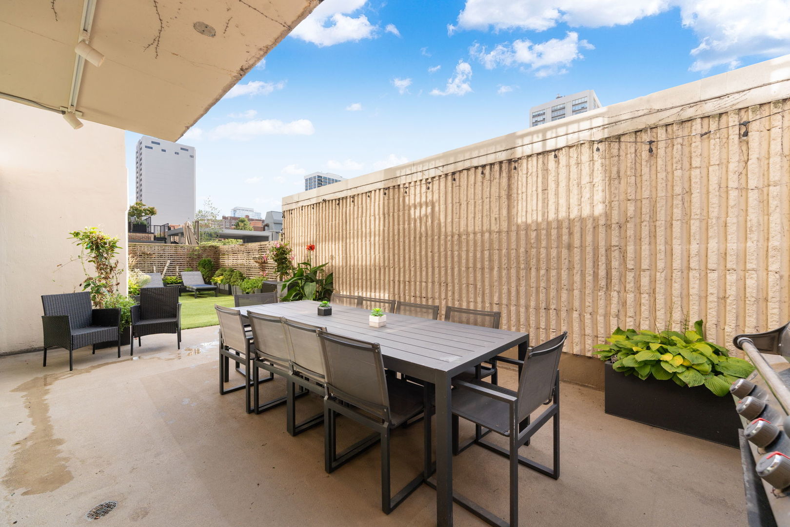 1516 North State Parkway, Unit 5D Chicago, IL 60610 - Photo 23 of 33 a view of a patio with a table and chairs