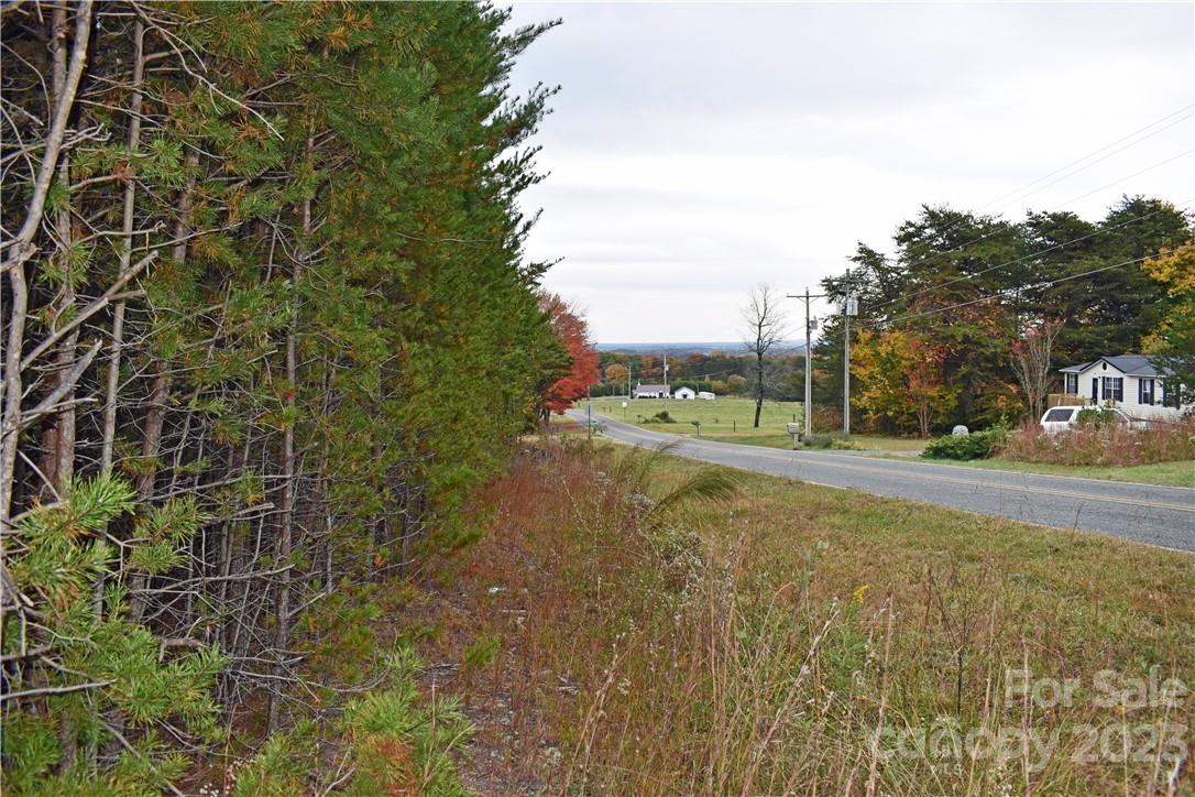 5342 Hope Road Vale, NC 28168 - Photo 26 of 39 a view of a street with a building and a street sign